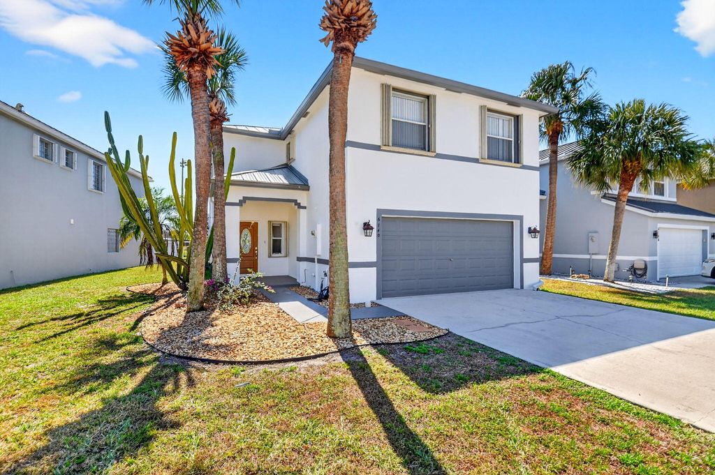 Photo of 6140 Spring Isles Boulevard, Lake Worth, FL 33463 (MLS # R11167546)