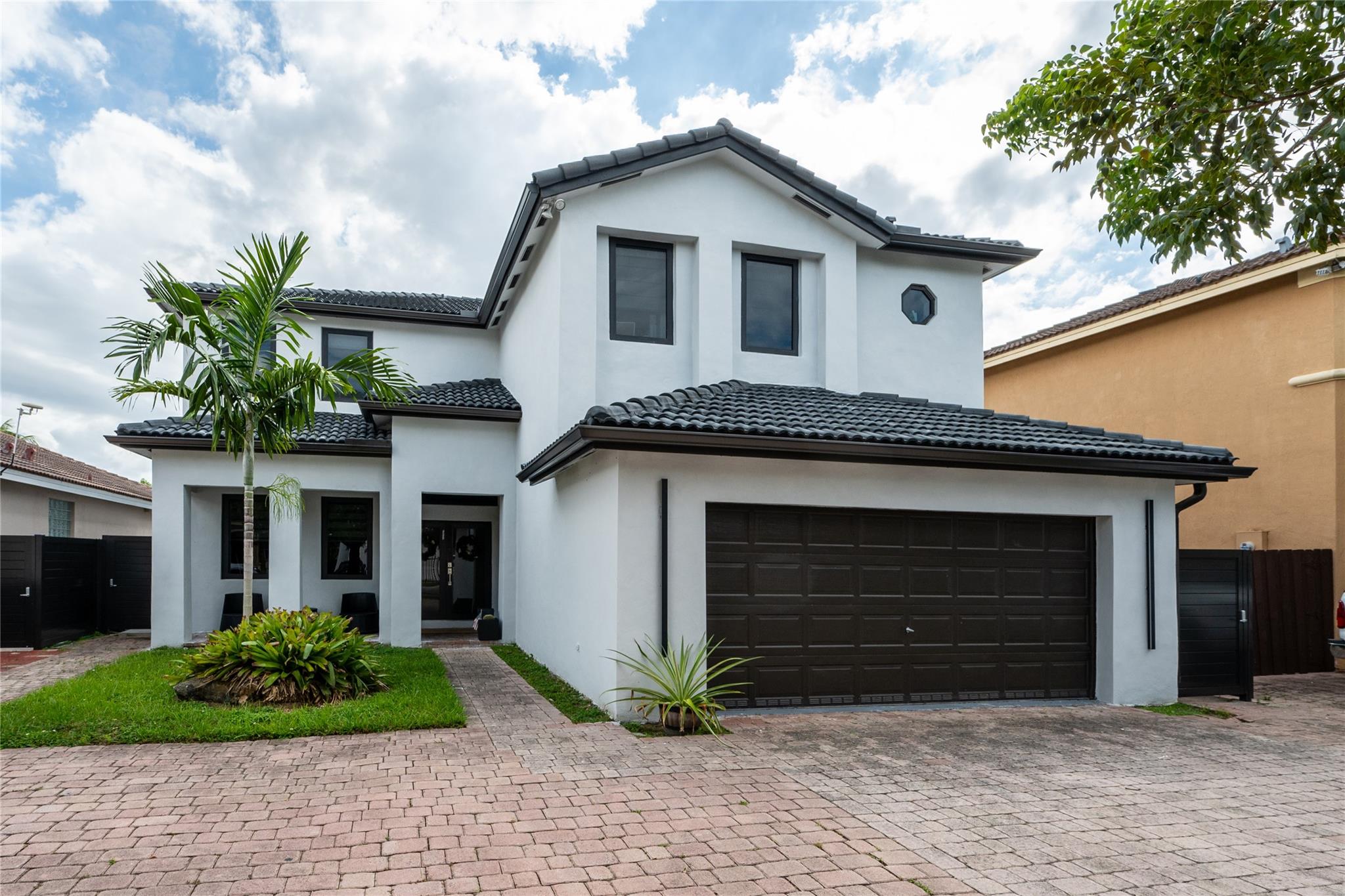 Welcome to your luxury-two story home in Miami. This stunning home features a dreamy master bedroom with walk-in California closets, plus three additional bedrooms for family or guests. New impact doors & windows (2022), and a/c unit (2024) Enjoy the Florida climate with a large water salt pool and new paved patio with fence (2023). A spacious additional room downstairs that can be used as an office, gym, or a fifth bedroom. A two-car garage with separate a/c (2024) and a large storage room inside, laundry room, and much more! Don't miss this home with an excellent location in a beautiful neighborhood. No HOA and no rental restrictions for investors. Schedule your showing before in gone!