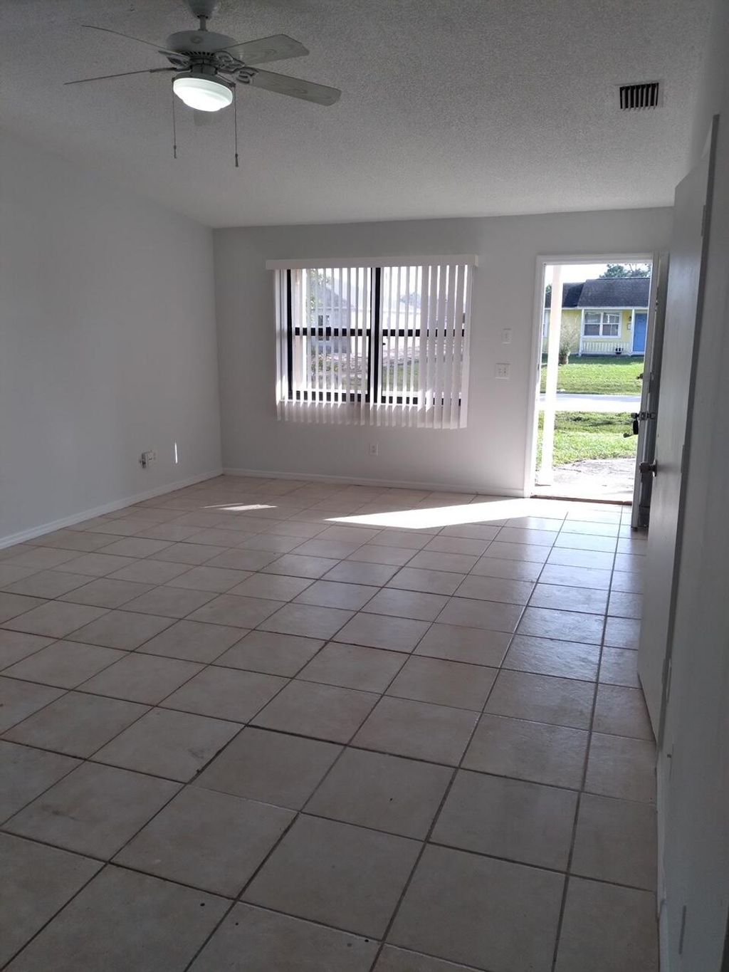 Photo of 1149 SW Estaugh Avenue, Port Saint Lucie, FL 34953 (MLS # R10951180)