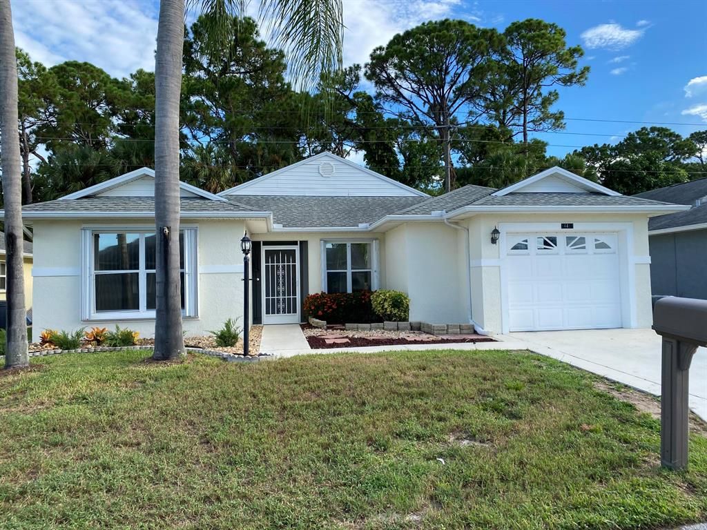 Photo of 14418 Aguila Avenue Ave, Fort Pierce, FL 34951 (MLS # R10825517)