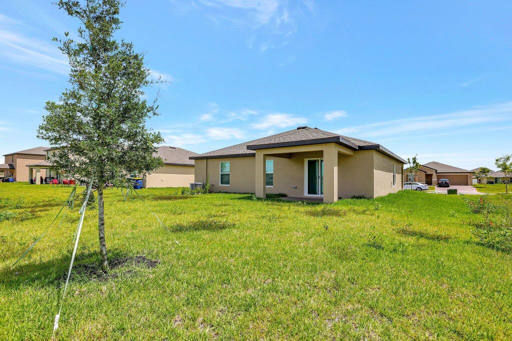 Photo of 4224 Longmour Lane, Fort Pierce, FL 34947 (MLS # R11002831)