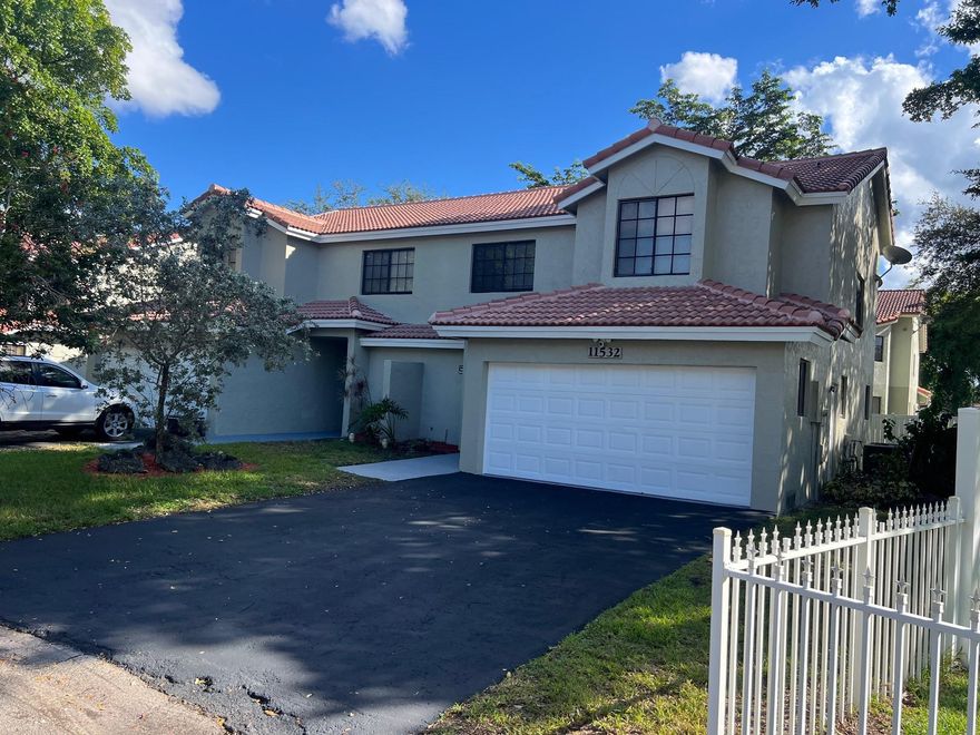 VERY SPACIOUS DUPLEX IN NORTH CORAL SPRINGS. FEATURES 3 BEDROOMS, 2 1/2 BATHROOMS WITH A 2 CAR GARAGE ON EACH SIDE. 2 STORIES. TILE FLOORS THROUGHOUT. OPEN FLOOR PLAN. VAULTED CEILINGS. NEWER STURDY BARREL TILE ROOF - 6 YEARS OLD. NEW 5 TON A/C JUST INSTALLED ON ONE SIDE. HUGE FENCED YARD FOR KIDS TO PLAY OR HAVE A PARTY / BAR-B-QUE. CUL-D-SAC. RIGHT SIDE UNIT JUST COMPLETELY REMODELED. INCLUDES NEW KITCHEN WITH GRANITE COUTERTOPS & STAINLESS STEEL APPLIANCES. ALL NEW BATHROOMS. NEW WOOD FLOORS THROUGHOUT THE UPSTAIRS. INTERIOR OF THAT UNIT JUST PAINTED. OVERALL EXTERIOR OF THE PROPERTY ALSO FRESHLY PAINTED AS WELL. 25-30 MINUTES TO FORT LAUDERDALE INT'L AIRPORT. 20 MINUTES TO WHITE SAND BEACH. 25 MINUTES TO WORLD FAMOUS SAWGRASS MILLS MALL FOR SHOPPING & UPSCALE RESTAURANTS. NO HOA.