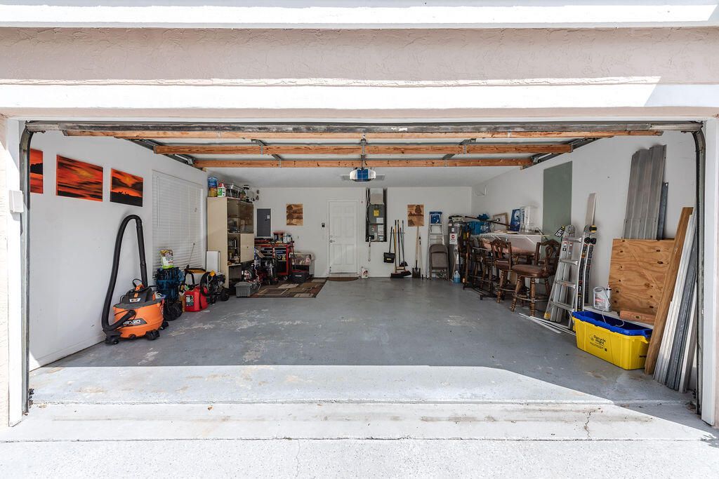 Photo of 1035 Island Manor Drive, Greenacres, FL 33413 (MLS # R11159387)