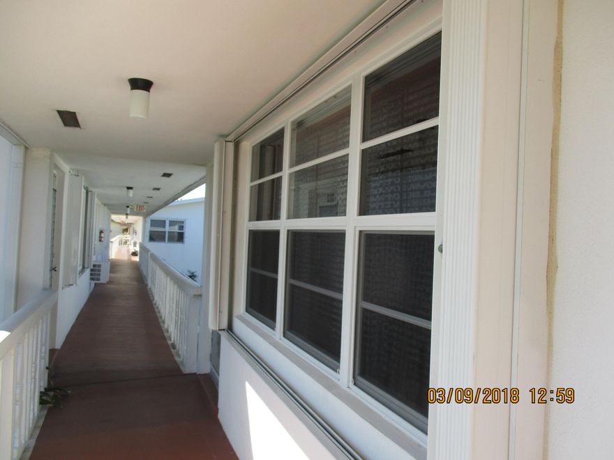 You MUST SEE this adorable condo.  Corner unit, completely redone, open kitchen, beautifully furnished with mahogany floors. Dual storm protection: hurricane windows and shutters. Near Haverhill gate.