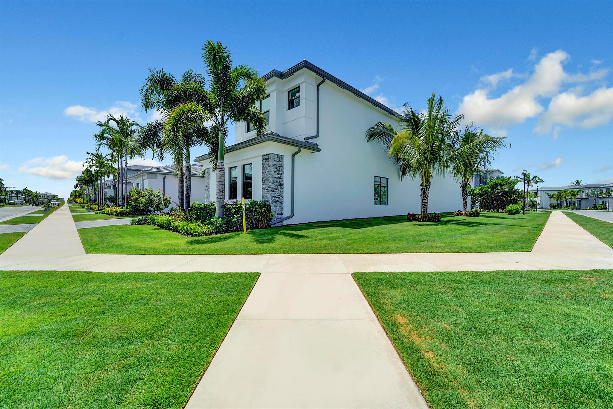 Experience refined elegance in this Corsica model a 5-bedroom, 6.5-bathroom luxury rental located in the exclusive Lotus Edge community in Boca Raton. With a thoughtfully designed layout that includes a club room, spacious loft, and a 3-car garage, this home offers modern living with every detail curated for comfort and style.NO CARPETS ,The owner is currently upgrading the home with modern engineered wood flooring in key areas, complementing the luxury tile throughout the rest of the home. Enjoy Custom blinds throughout the entire house, offering convenience and privacy. A fenced yard is also being installed, ideal for families or added peace of mind.Inside, the open-concept kitchen features sleek cabinetry, premium appliances, and generous entertaining space.