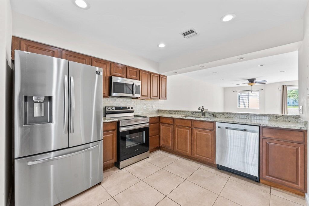 Photo of 6214 Riverwalk Lane #2, Jupiter, FL 33458 (MLS # R11099766)