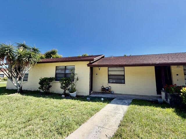 Photo of 419 GLENWOOD Drive, West Palm Beach, FL 33415 (MLS # B26063049)