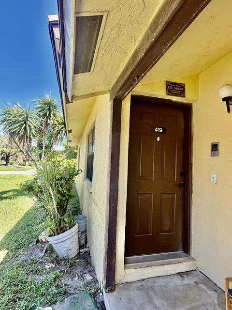Photo of 419 GLENWOOD Drive, West Palm Beach, FL 33415 (MLS # B26063049)