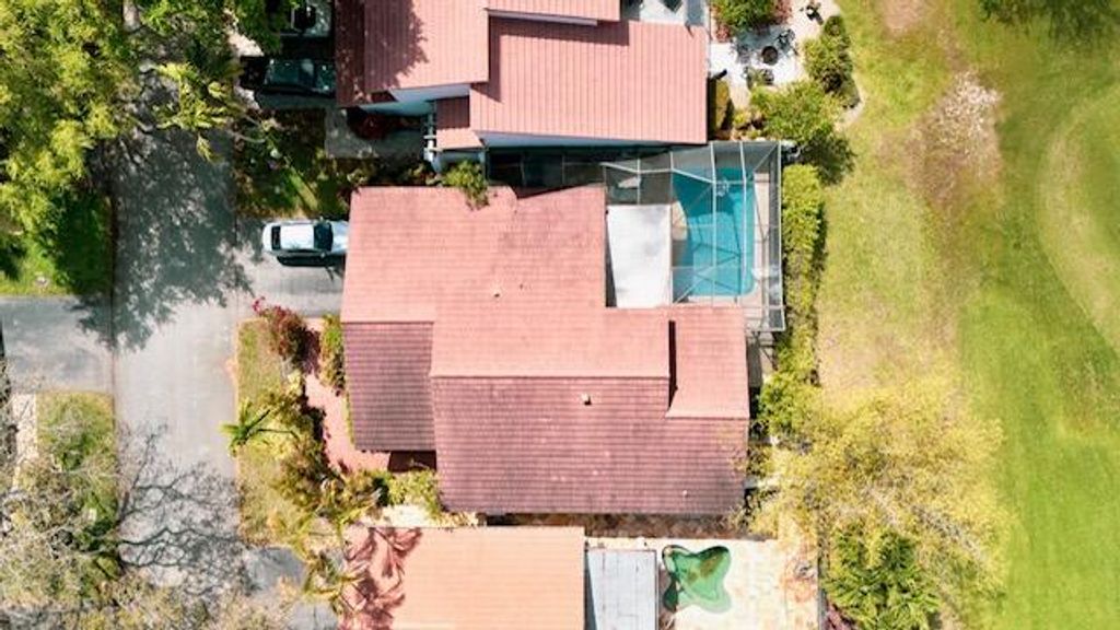 Photo of 665 Hollows Circle, Deerfield Beach, FL 33442 (MLS # B26000622)