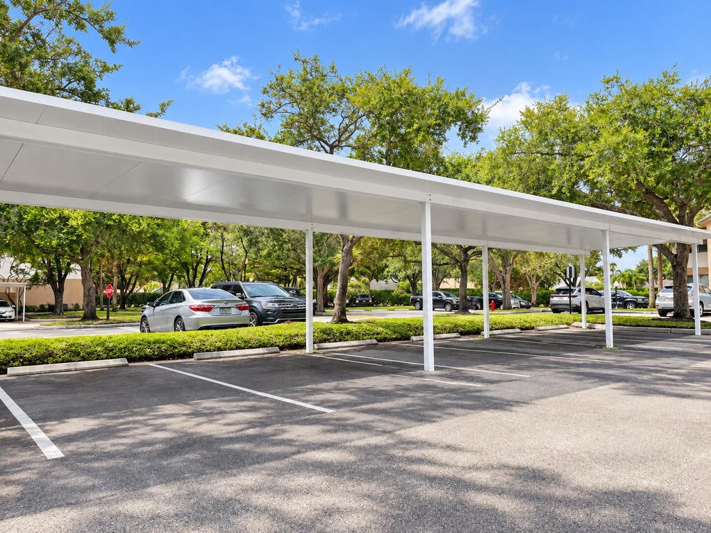 Photo of 9701 WESTVIEW Drive #1415, Coral Springs, FL 33076 (MLS # B26079508)