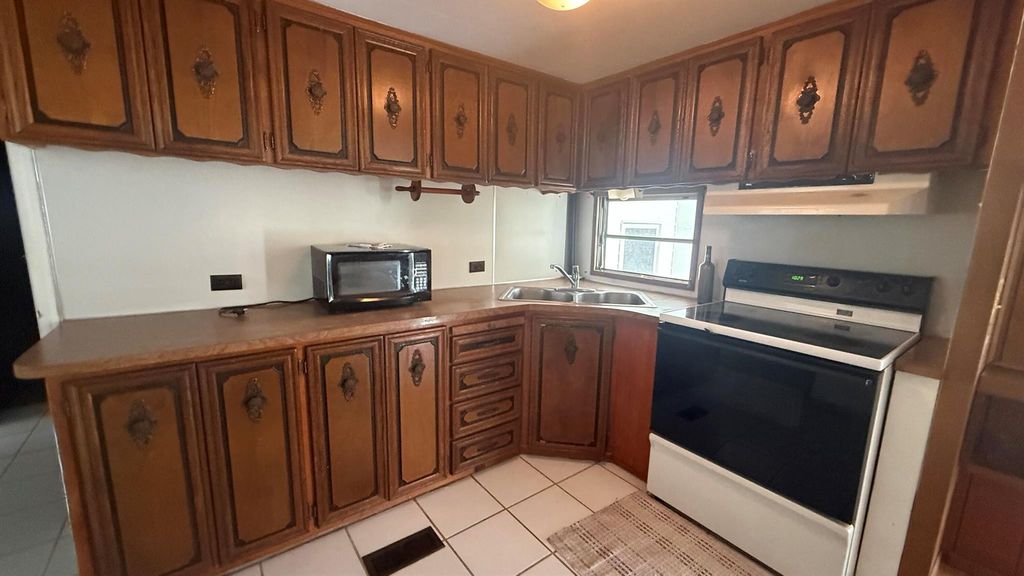 Photo of 7690 SE Eagle Avenue, Hobe Sound, FL 33455 (MLS # R11095365)