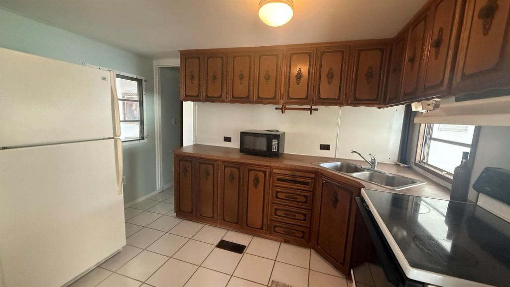 Photo of 7690 SE Eagle Avenue, Hobe Sound, FL 33455 (MLS # R11095365)