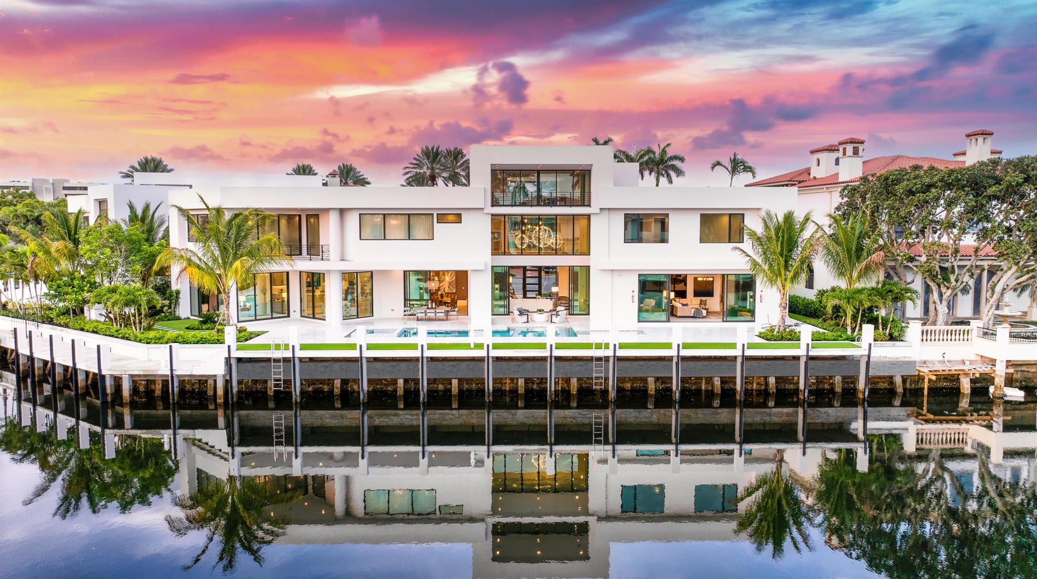 ''New'' Modern/Organic-inspired Sanctuary Point Estate sited on 173+/- feet of wraparound waterfrontage in The Sanctuary by awarding-winning team of Albanese Home Builders, Inc., Quinn Miklos Architects and Marc-Michaels Interior Design. A towering foyer entrance sets the stage for this 3-level estate encased in glass with panoramic water views and tranquil bird preserve setting from all major rooms. Epic primary wing with sleek dual baths and wardrobes and separate lounge. Resort-style pool/spa and patio with entertainment lanai and cabana. Rare, protected mega-yacht side dockage with straight 131+/- feet.