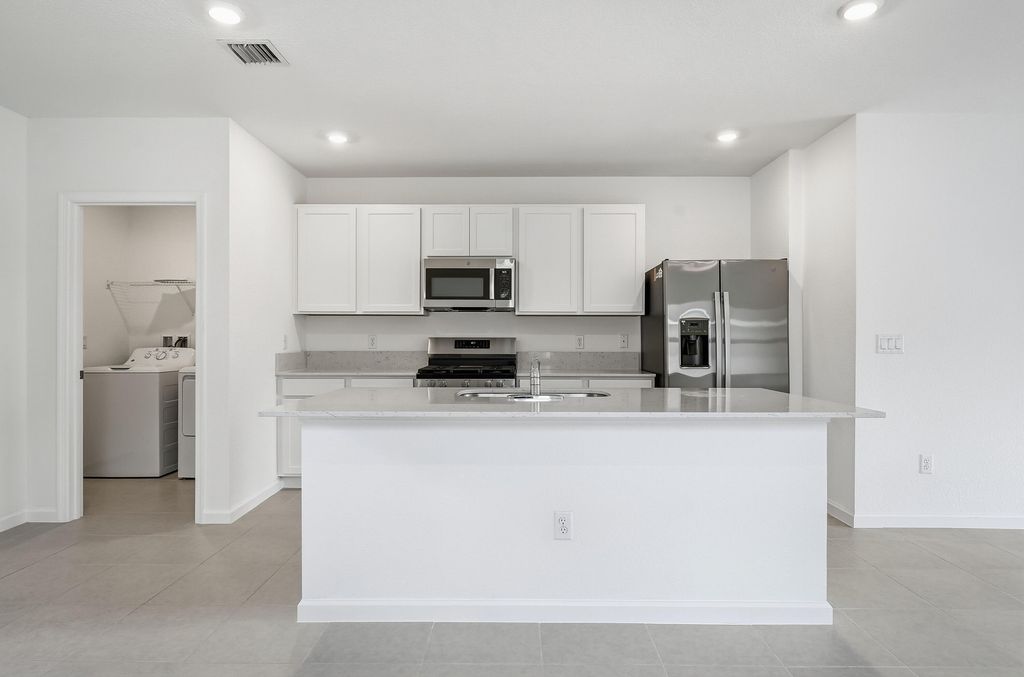 Photo of 10436 NW Suncrest Loop, Port Saint Lucie, FL 34987 (MLS # R11166919)