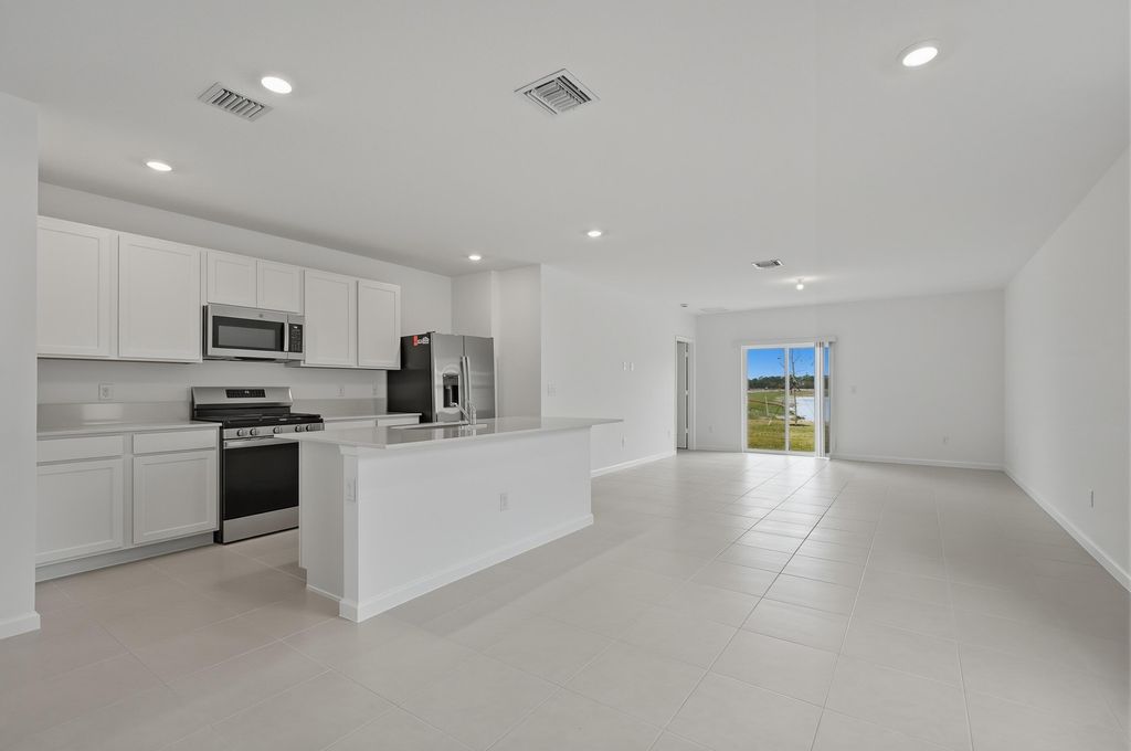 Photo of 10436 NW Suncrest Loop, Port Saint Lucie, FL 34987 (MLS # R11166919)