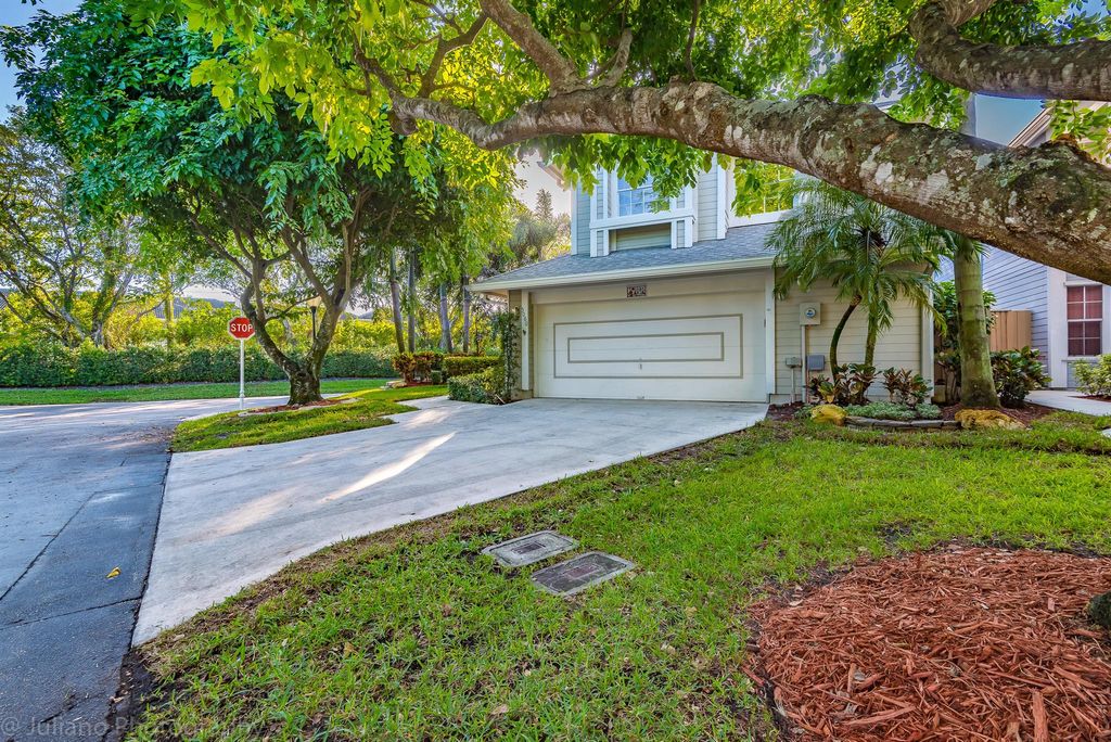 Photo of 5080 Point Alexis Dr, Boca Raton, FL 33486 (MLS # R11097437)