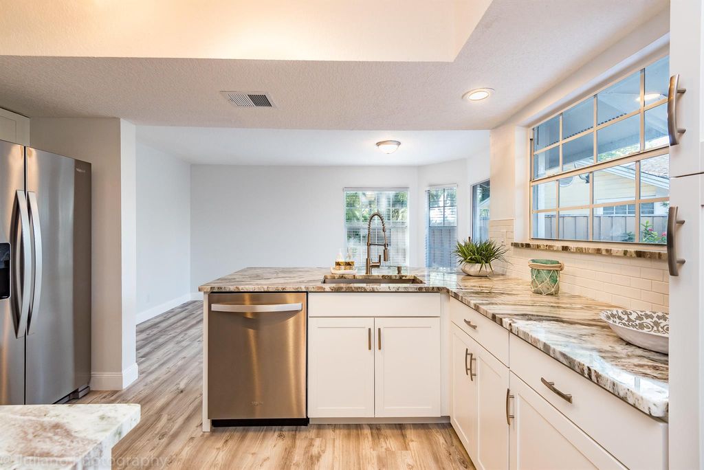 Photo of 5080 Point Alexis Dr, Boca Raton, FL 33486 (MLS # R11097437)