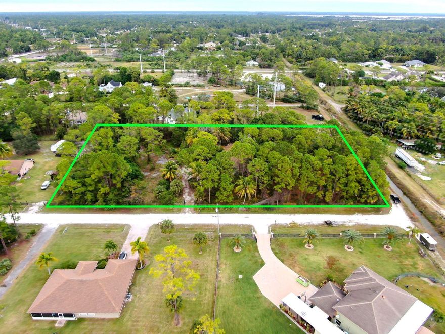 Extra large 2.46 acre vacant lot in a beautiful area with end of street privacy and
no floodplain. Located in unincorporated Palm Beach County with no HOA which
provides flexibility to build what you want. Water well/septic required.
