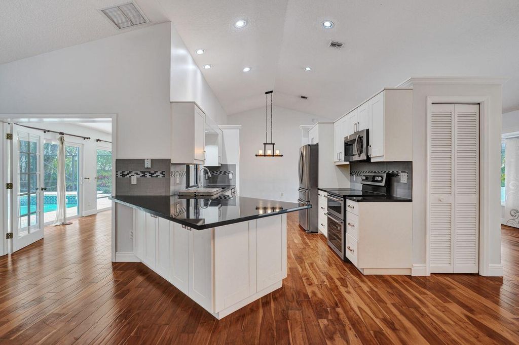 Photo of 1283 Barnstaple Circle, Wellington, FL 33414 (MLS # B26020581)