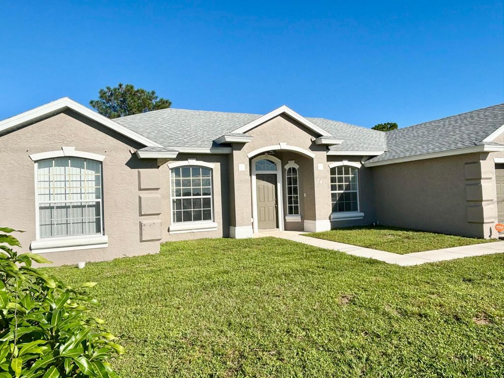 Photo of 741 NW North Macedo Boulevard, Port Saint Lucie, FL 34983 (MLS # R11132121)