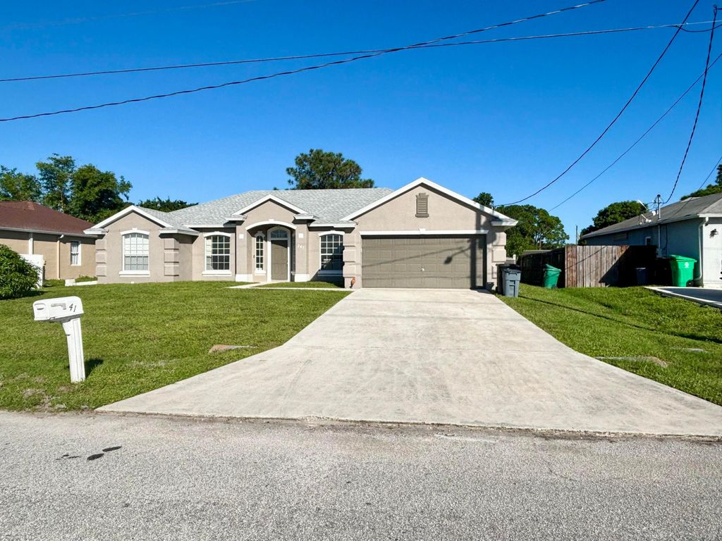 Photo of 741 NW North Macedo Boulevard, Port Saint Lucie, FL 34983 (MLS # R11132121)