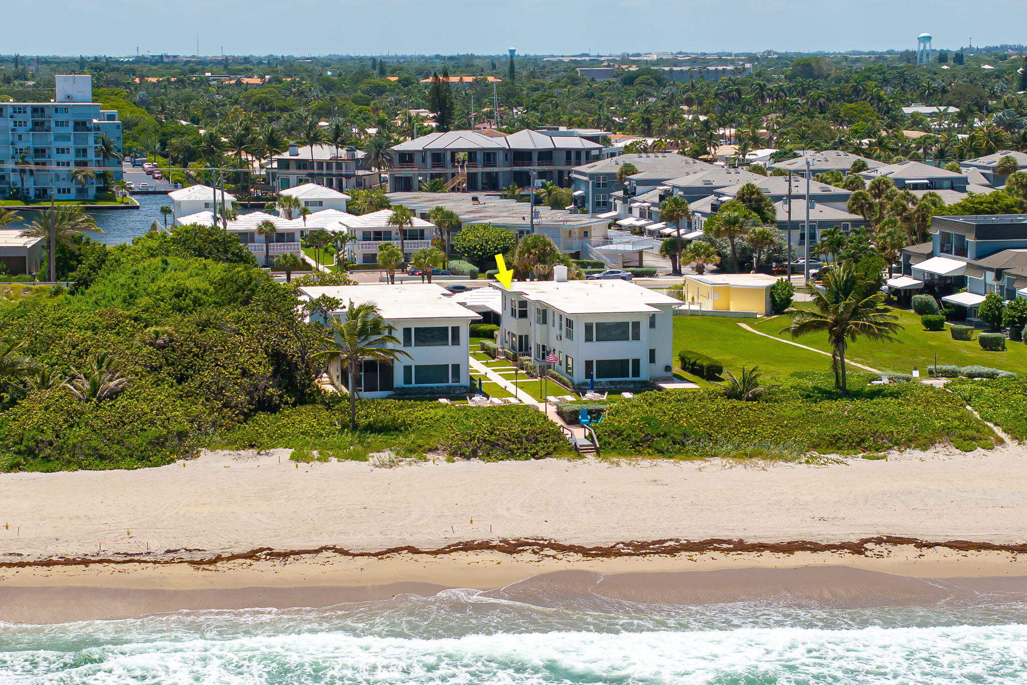 Ultra special condo featuring access to a huge open patio with more villa on the beach vibes. Truly special and unlike all the other boring high-rise condos. Think more, cottage on the beach than condo. Oceanfront property with breathtaking ocean views from its quiet 2nd floor location & HUGE open balcony. It's the perfect escape, right on Hillsboro Mile, in a quiet, boutique small community. Once inside, you'll be greeted by stunning upgrades, including impact windows for plenty of natural light; a modern kitchen & bathroom, plus an in-unit washer & dryer. Private beach access is just a few feet away... it doesn't get better than this! The heated community pool is the perfect place to relax. Whether you're looking for a vacation getaway or a permanent residence, this property has it all!