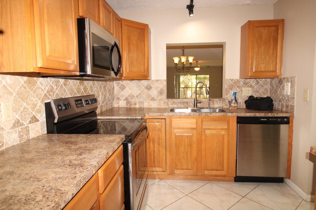 Photo of 2955 SW 22nd Avenue #2080, Delray Beach, FL 33445 (MLS # B26039283)