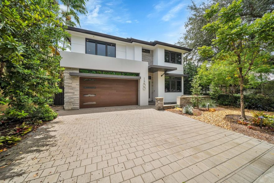 Located in our finest Rio Vista location!! This luxury custom magnificent contemporary offers one-of-a-kind architecture and finishes. Colossal open floor plan w/ gourmet chef’s kitchen w/walk in pantry, dining room and grand entertainment room all overlooking the lushly landscaped private yard with heated saltwater pool, cascading waterfall and spa and large covered patio with a full summer kitchen. This home is equipped with smart features including a full house generator and is energy efficient. Enjoy being close to the beaches, shopping, great restaurants, airport, yacht clubs, schools and everywhere you want to be.