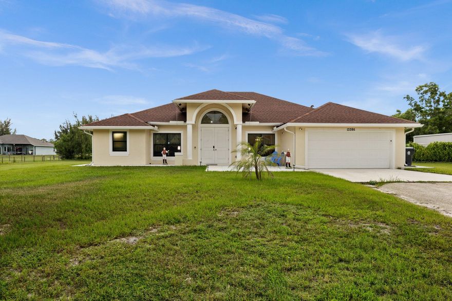 Discover modern living at its best in this newly built 2023 CBS home, perfectly situated on 1.15 acres in the desirable Acreage/West Palm Beach area. This light-filled residence features 3 bedrooms plus a versatile den/office/flex room and 2 tastefully finished bathrooms. Designed with an open, airy floor plan and vaulted ceilings, the home welcomes you with abundant natural light, clean lines, and contemporary finishes throughout. The impact windows offer peace of mind and energy efficiency, while the spacious layout and screened in patio provides effortless flow for both everyday living and entertaining. The home also has foam insulated roof, built-in wall pest control system and underground power lines. Set on a generous, private lot with plenty of room to create your ideal outdoor- oasis, this property offers the perfect blend of modern comfort and peaceful living - just minutes from all the conveniences of Palm Beach County.