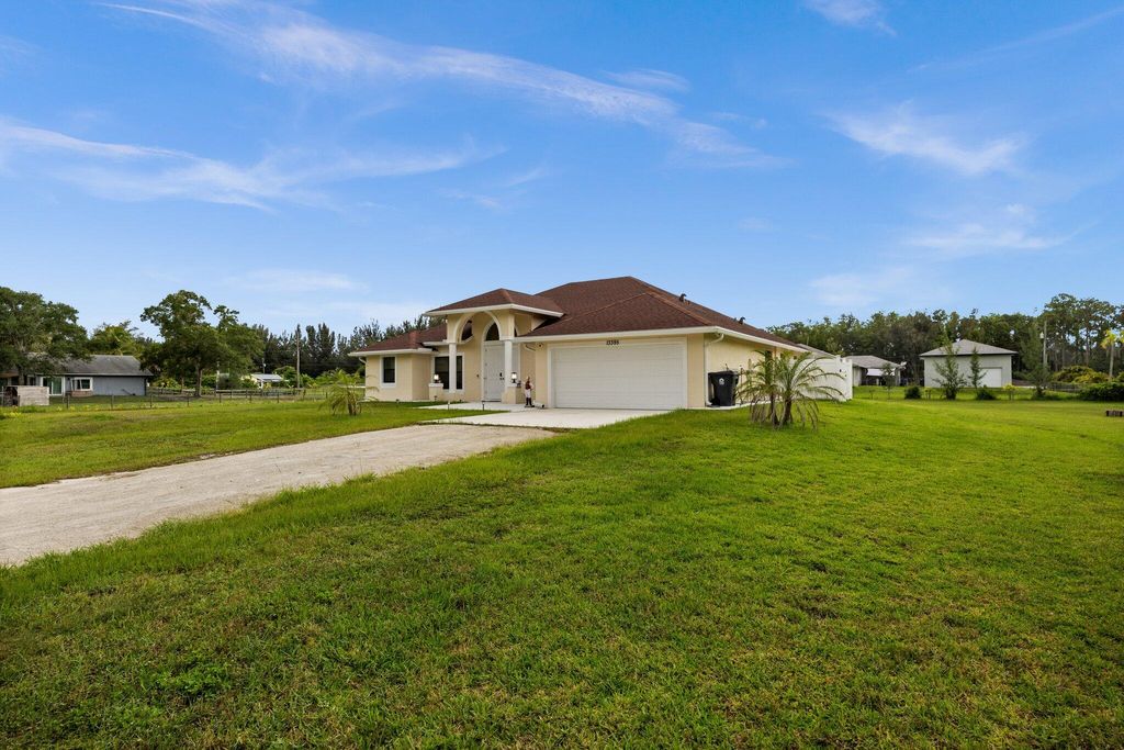 Photo of 13395 59th Court N, West Palm Beach, FL 33411 (MLS # R11141452)