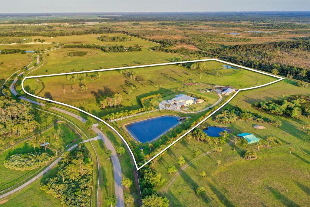 Photo of 2985 SW Trailside Path Path, Stuart, FL 34997 (MLS # R10790150)