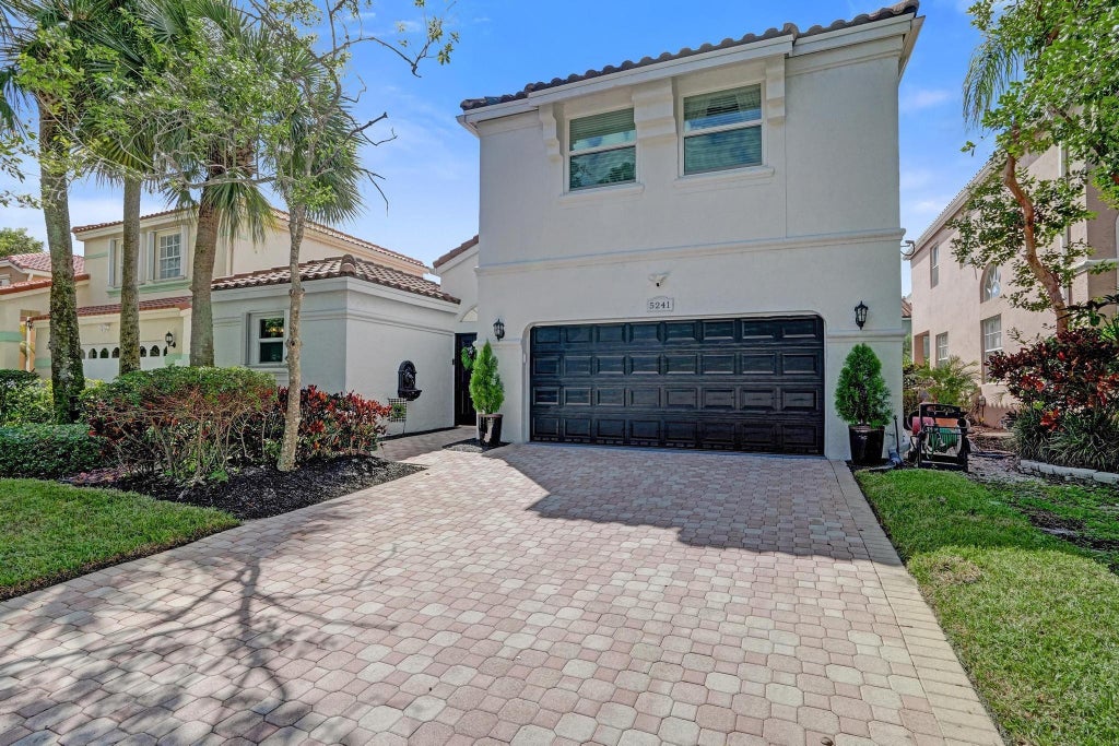 Photo of 5241 NW 106th Drive, Coral Springs, FL 33076 (MLS # F10528465)