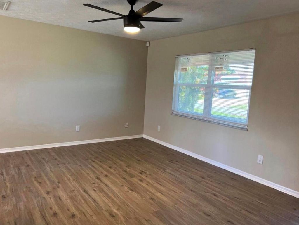 Photo of 450 SW Dagget Avenue, Port Saint Lucie, FL 34953 (MLS # R11086885)