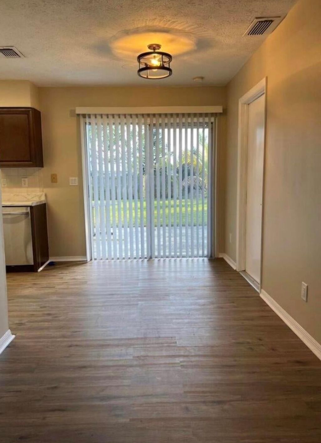 Photo of 450 SW Dagget Avenue, Port Saint Lucie, FL 34953 (MLS # R11086885)