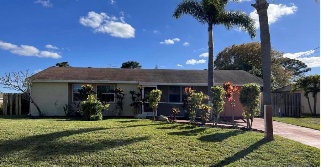 Photo of 450 SW Dagget Avenue, Port Saint Lucie, FL 34953 (MLS # R11086885)