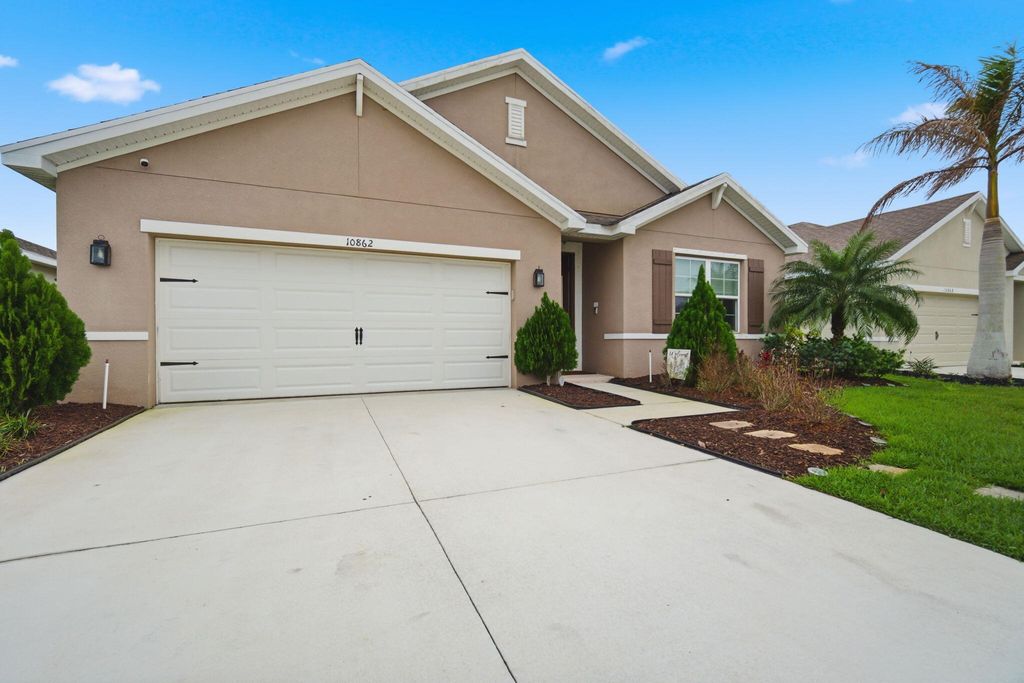 Photo of 10862 SW Pacini Way, Port Saint Lucie, FL 34987 (MLS # B26008051)