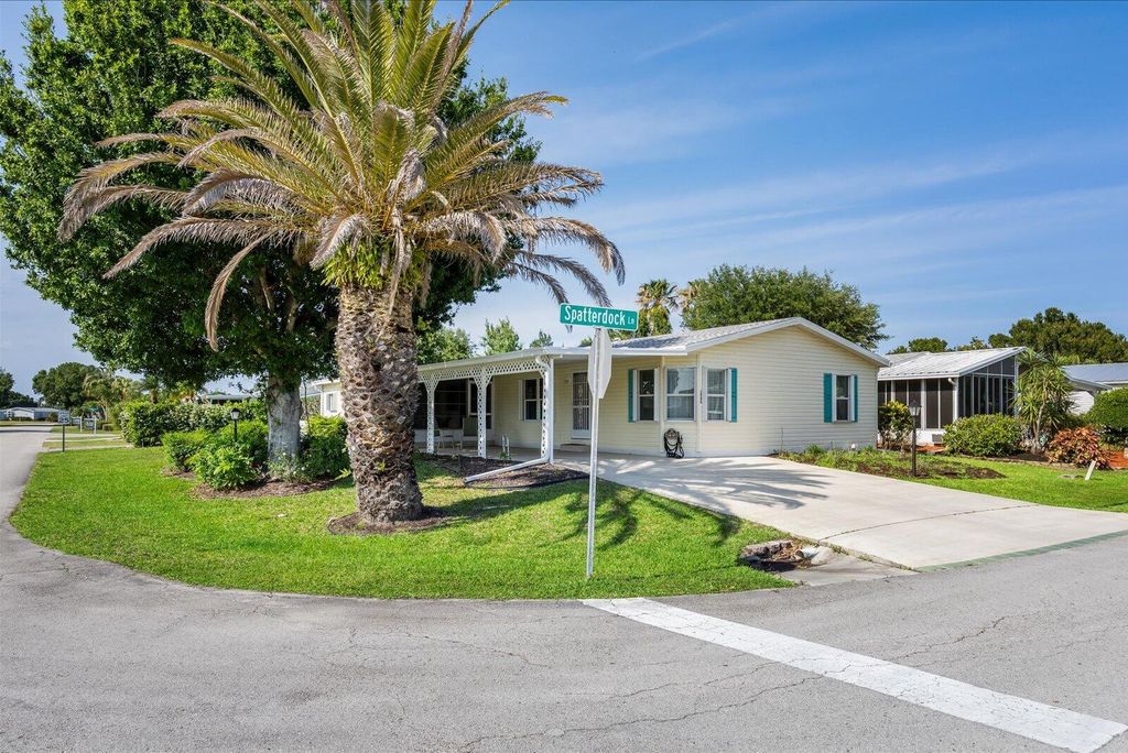 Photo of 3800 Spatterdock Lane, Port Saint Lucie, FL 34952 (MLS # B26026842)