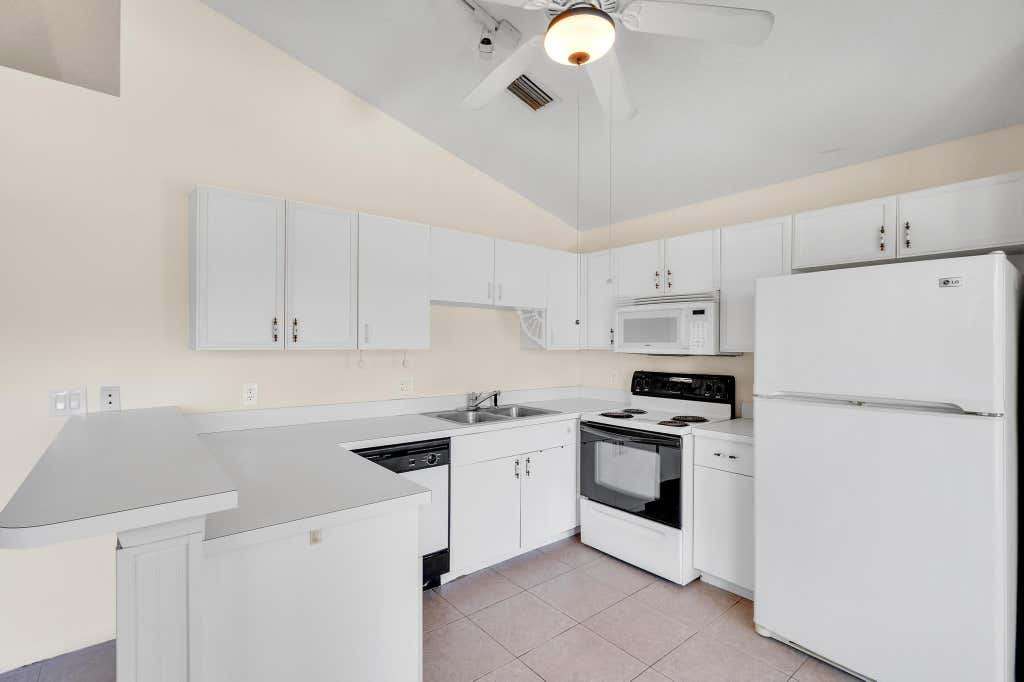 Photo of 635 NW San Remo Circle, Port Saint Lucie, FL 34986 (MLS # R10993167)