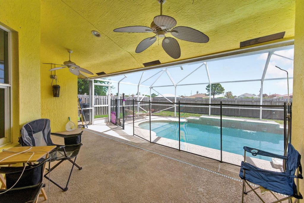 Photo of 5785 NW Dublin Drive, Port Saint Lucie, FL 34986 (MLS # B26010431)