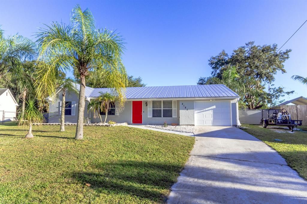 Photo of 2181 SE Triumph Road, Port Saint Lucie, FL 34952 (MLS # R10762060)