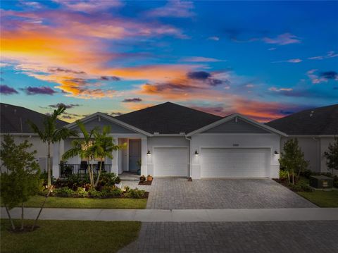 Photo of 6369 NW Cloverdale Ave, Port St Lucie, FL 34987 (MLS # F10532709)