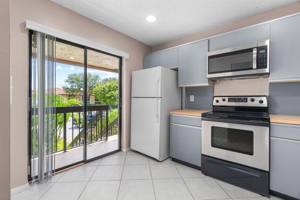 Photo of 5201 W Club Circle #203, Boca Raton, FL 33487 (MLS # R11129346)