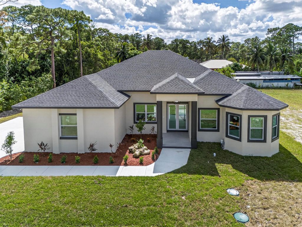 Photo of 15174 69th Court N, The Acreage, FL 33470 (MLS # R11133623)