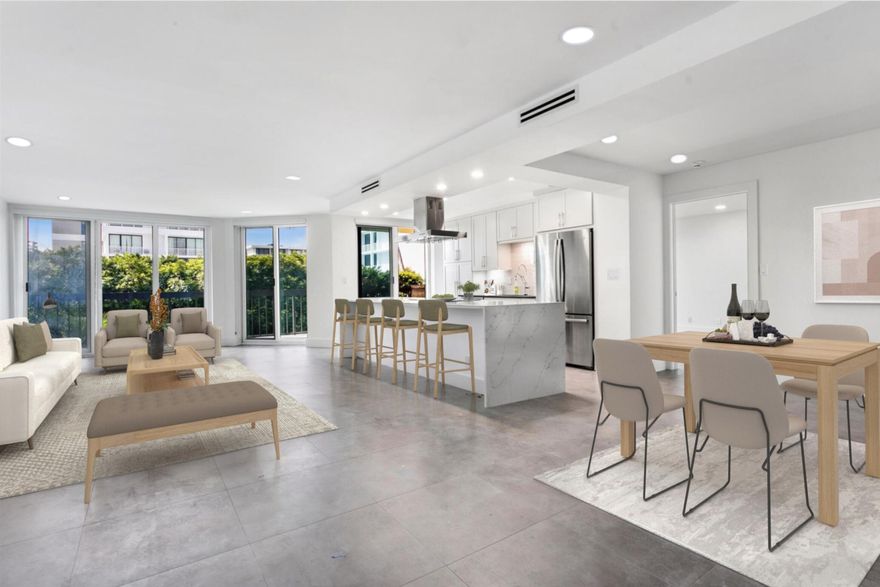 Fabulous Renovation! Open Kitchen, large living room, separate dining area, laundry room, large entryway, multiple large closets, 2 bedrooms, 2 baths, garage parking, pool, gym, on site management, and close to everything.