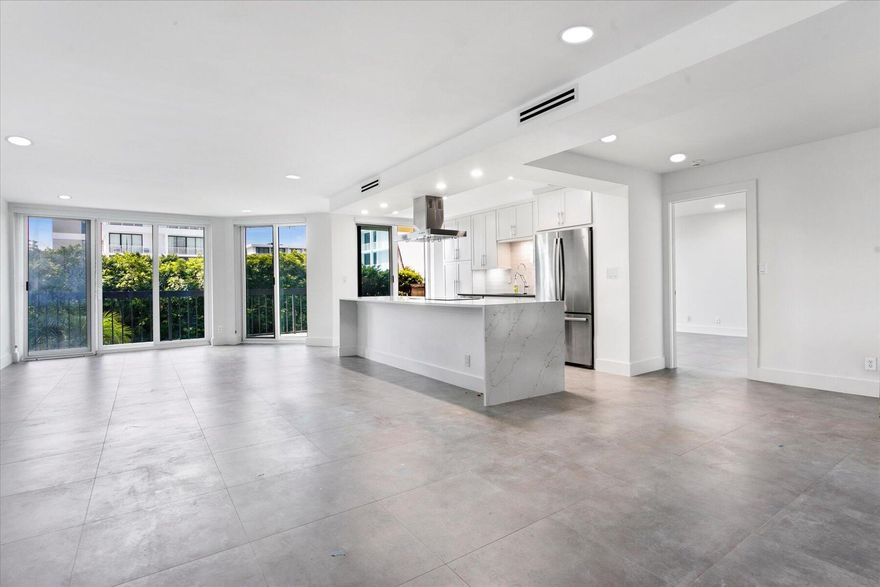 Fabulous Renovation! Open Kitchen, large living room, separate dining area, laundry room, large entryway, multiple large closets, 2 bedrooms, 2 baths, garage parking, pool, gym, on site management, and close to everything.