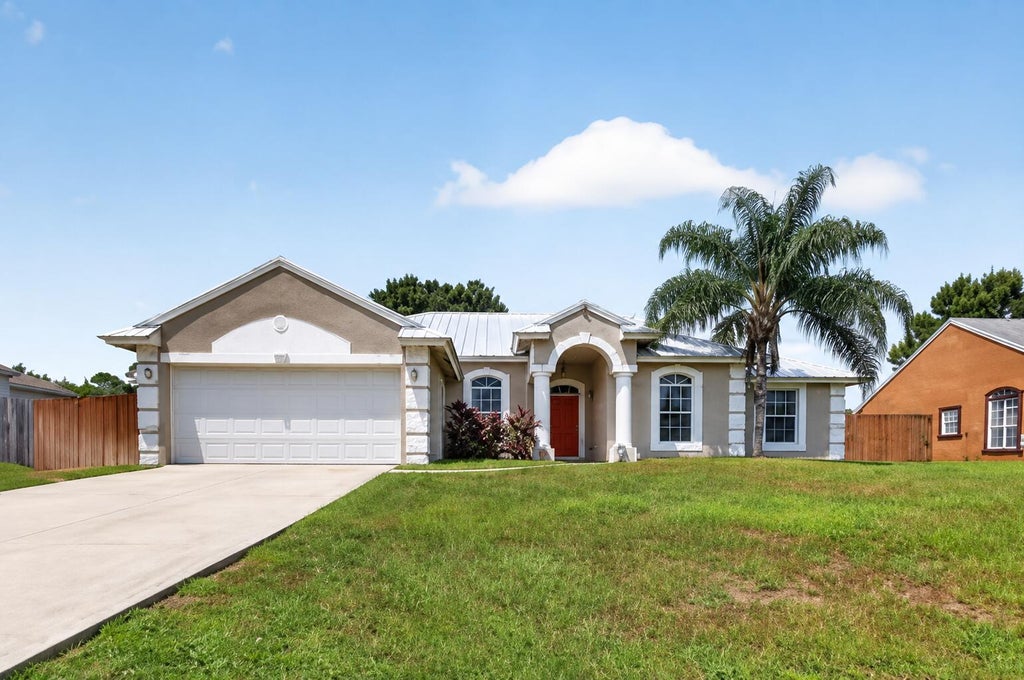 Photo of 1561 SW GADSAN Avenue, Port Saint Lucie, FL 34953 (MLS # B26065360)