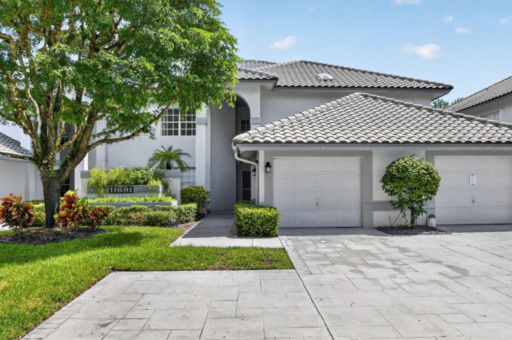 Photo of 11691 Briarwood Circle, Boynton Beach, FL 33437 (MLS # B26078667)