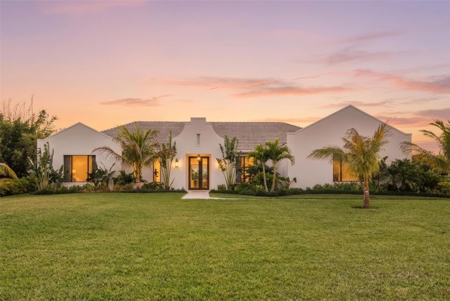 Unique & spectacular opportunity to live in custom home on 1.25 acre PRIME LOCATION in the font end of Jupiter Farms. Looking for an architectural, magazine-worthy home w/ resort-like backyard? This is it: Functional & thoughtful layout of 3898sqft: 4bed/4bath + playroom + office + mudroom +walk-in pantry + ample storage! Elevated finishes & systems throughout: white oak hardwood fls; natural stone; 10.5 ft ceilings,10ft impact sliders/exterior doors. Walk in closets. Custom kitchen & baths. Warm modern design w/ soft archways; oversized hood detail in the chef's kitchen & gas fireplace w/herringbone inlay.  Too many details to list; come see this swoon worthy home for yourself.