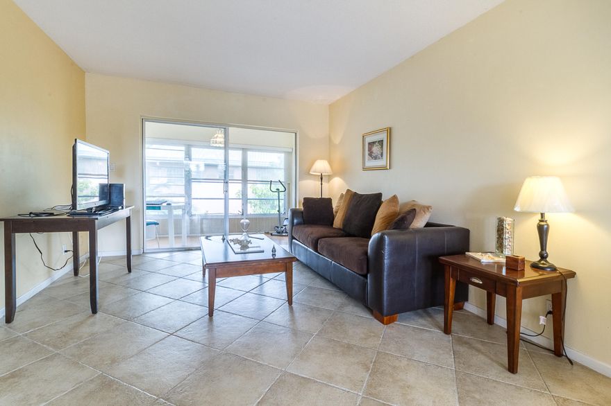 Boca Verde is a quiet, elegant 55+ community, conveniently located near the 5th Ave shops and restaurants. You can walk or bike to the beach. Minutes from the FAU campus, Palm Beach State College and public transportation. This light and bright condo offers tasteful kitchen upgrades with tile flooring in the kitchen, living area and bath. The bedroom and patio have wood laminate flooring with a view of the gardens. Recently remodeled clubhouse, with a pool and shuffle board area. Assigned parking with lots of guest spots. A leisurely stroll away from Lake Wyman Park on the intracoastal.