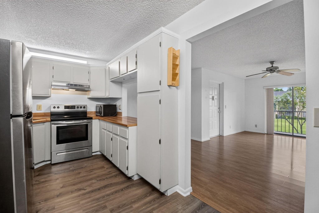 Photo of 720 SUNNY PINE Way #G2, Greenacres, FL 33415 (MLS # B26068947)